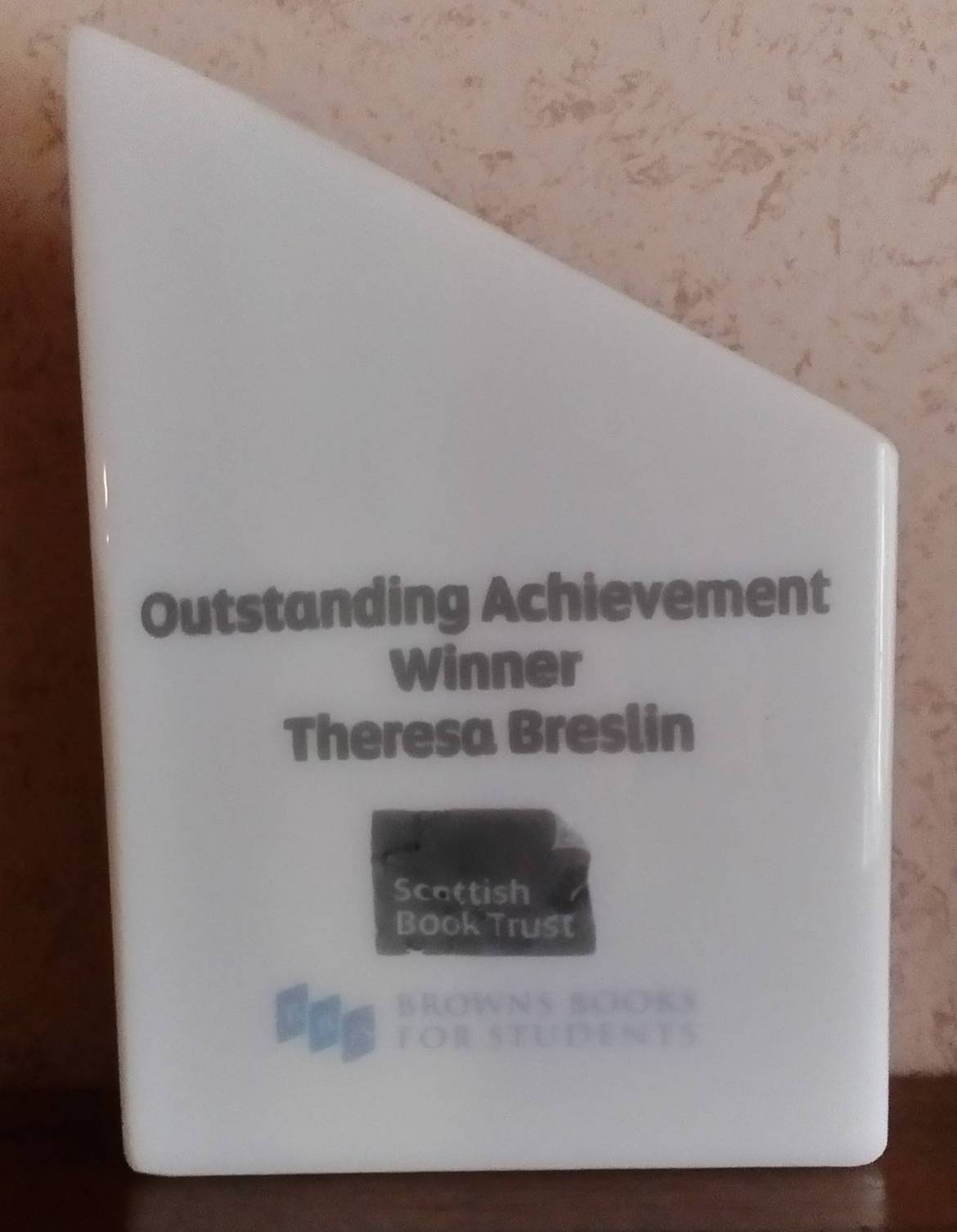 Outstanding-Achievement-Award-e1555499686405.jpg